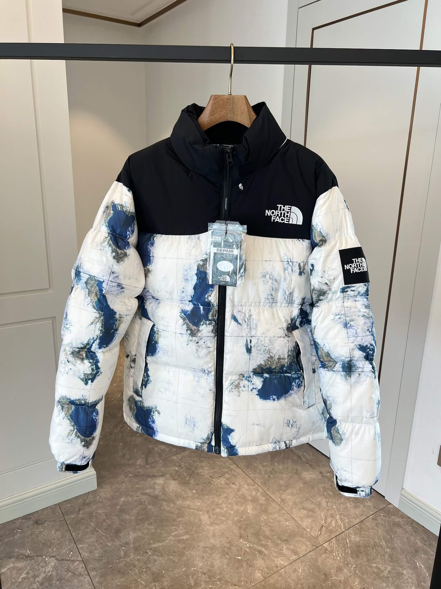 The North Face x Invincible 1996 Retro Nuptse Down Jacket - World Map Print. - Image 4
